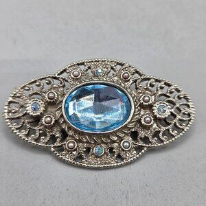 Vintage Silver Tone Filigree Brooch With Blue Glass and Faux Pearl Accents